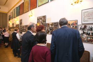 Participants of the Jubilee meeting at the Music and Literature Club in Wrocław 02.03.2019. <br>   watching a photographic exhibition documenting the 30 years of TiFL's activity.  Photo by Waldemar Marzec.